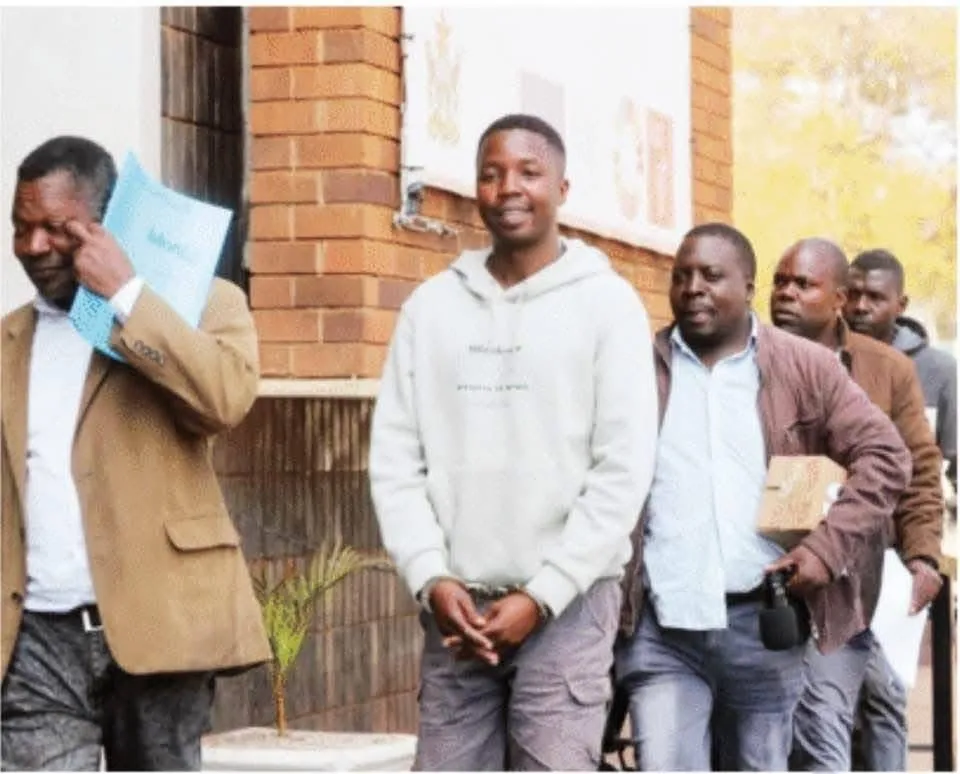 Pictures Of Arrested ZRP Cop Mandizvidza Smiling At Court ZimEye
