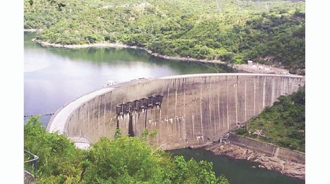 KARIBA SINKS YET SHINES Lake levels drop but power flows