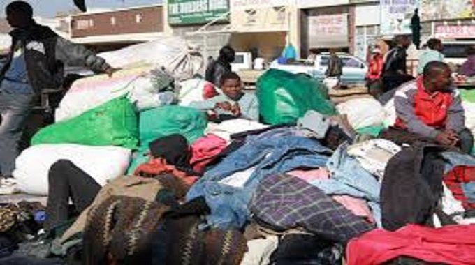 BANNED SECOND-HAND CLOTHES NOW LINKED TO DRUG CARTELS Minister says bales smuggle more than jackets