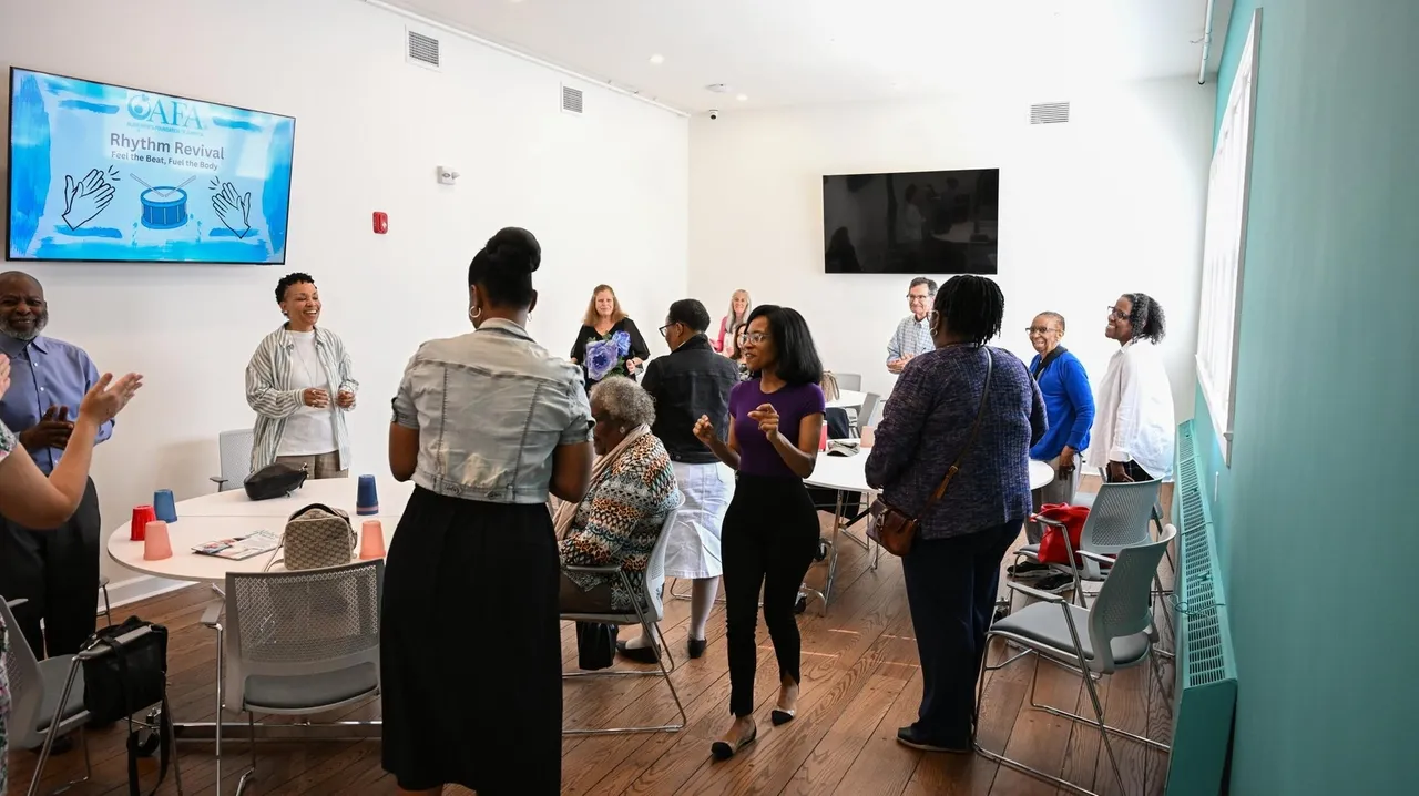 Participants take part in a movement and dance class at the first satellite office of the Alzheimers