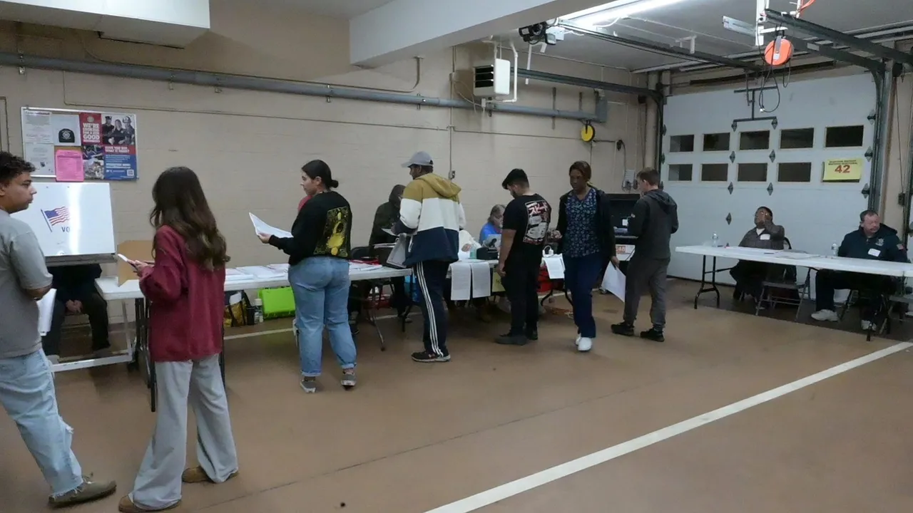 Voters at the Mastic Beach Fire Department cast their ballot for the 2024 presidential election on T