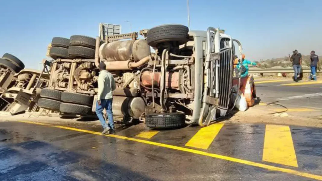 WATCH South African Truck Overturns at Trabablas Interchange Driver Hospitalised