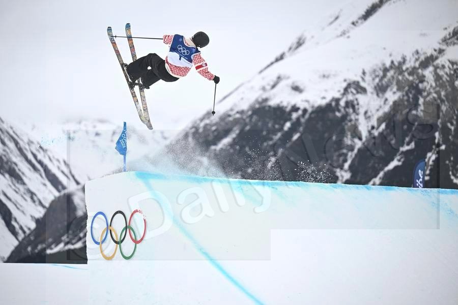 Norway's Ruud strikes gold as weather tests