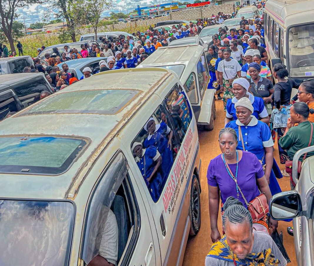 Mourners Gather for Funeral of Church Members...