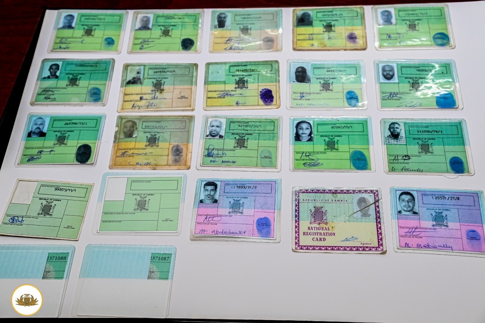 Six jailed two years for forging national registration cards